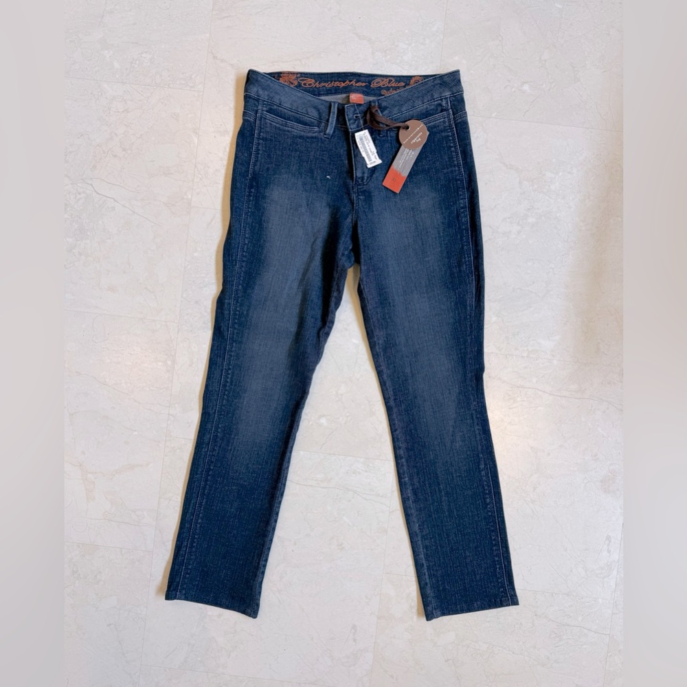 Christopher Blue medium rise cigarette leg jean. Size 2